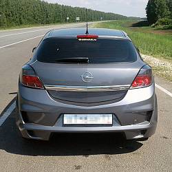 Бампер задний DM Style OPEL Astra
